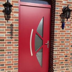 porte alu rouge fenetrea